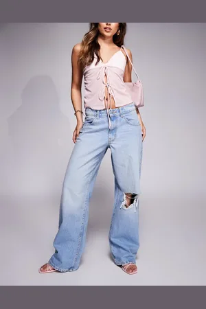 ASOS Baggy wide leg jean in pale wash with knee rip