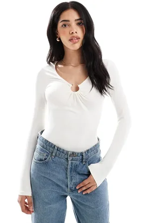 New Look Long sleeve bodysuit with trim detail in cream