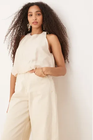 MANGO Round neck sleeveless soft bubble hem top in beige
