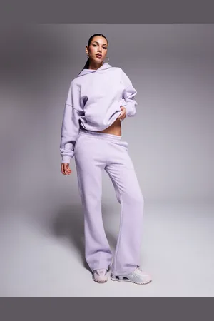Kaiia Studio embroidered swirl logo pocket detail jogger co-ord in lilac and pink
