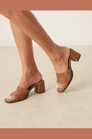 ASOS Hallie premium suede mid heeled mules in camel