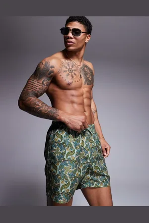 ASOS Swim shorts in mid length with paisley print in sage