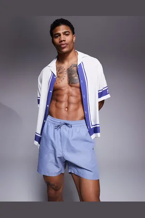 ASOS Swim shorts in mid length in