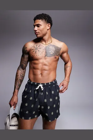 ASOS Swim shorts in short length with seaweed print in