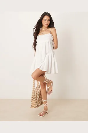 ASOS Babydoll mini dress with ruffle hem in