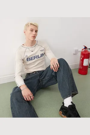 COLLUSION Long sleeve shrunken Berlin graphic football tee in stone