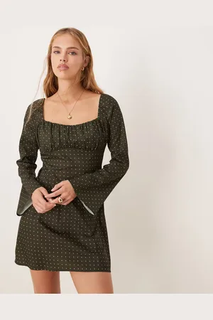 Kiss The Sky Polka dot mini dress in forest