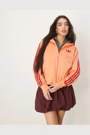 adidas Firebird Loose track top in orange and red
