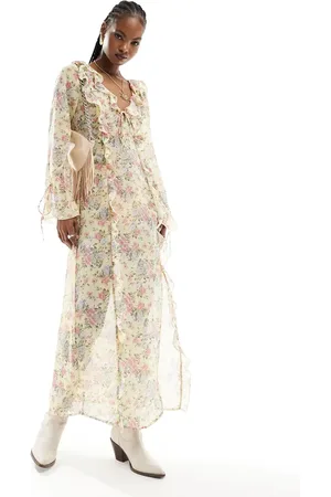 Kiss The Sky Sheer maxi dress with ruffles and tie cuffs