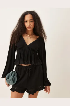 ASOS Crinkle tie back balloon sleeve top with lace trim in