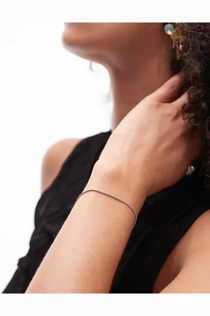 Topshop Pip waterproof stainless steel snake bracelet in tone