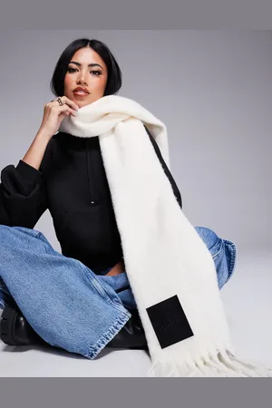 ASOS Weekend Collective fluffy blanket scarf with badge in cream