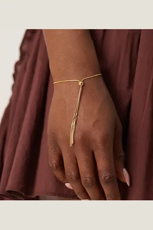 Orelia Plated slider tassel bracelet in pale