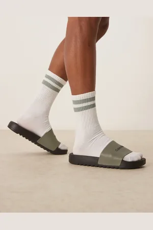 Calvin Klein Logo sliders in olive and
