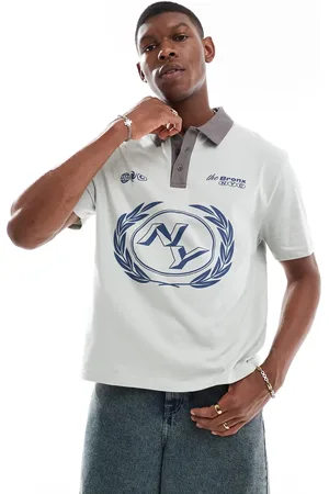 ASOS Relaxed boxy polo with front graphic in