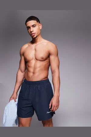 ASOS Swim shorts in mid length with embroidery in