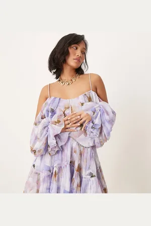 ASOS ASOS DESIGN Petite draped off shoulder tiered mini dress with lace inserts in blurred abstract
