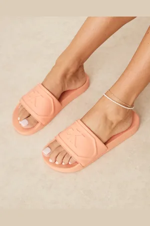 Calvin Klein Logo puff sliders in pastel