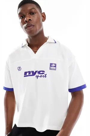 ASOS Boxy oversized polo with cut and sew and sports graphics in
