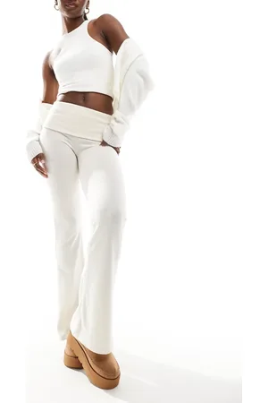 Bershka Fold over waistband soft touch flared trousers in ecru
