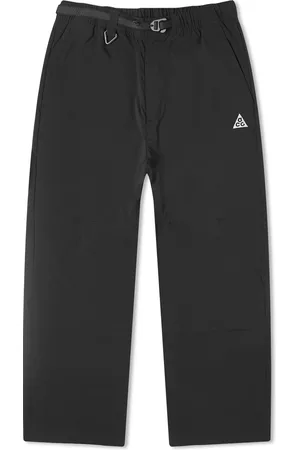 Buy Nike Black One 7/8 Graphic Pants in French Terry for Women in UAE