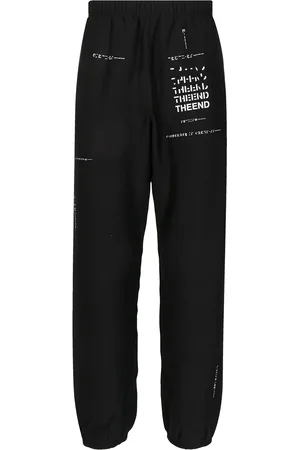 Takahiromiyashita The Soloist Slogan-print track pants