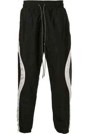 MOSTLY HEARD RARELY SEEN Wave stripe-print track pants