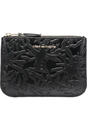Comme des Garçons Embossed leather wallet