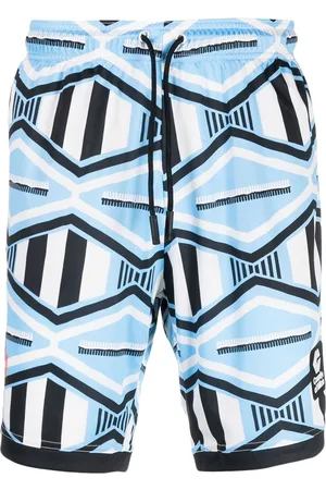 MARCELO BURLON Patterned drawstring track shorts