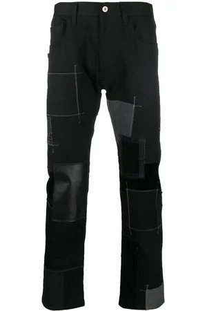 JUNYA WATANABE Patchwork cotton-leather jeans