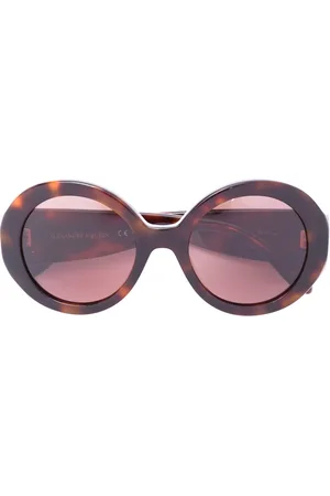 Alexander McQueen Mini stud round frame sunglasses