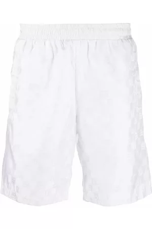 MISBHV Monogram-print track trousers