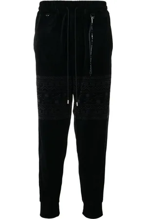 MASTERMIND Logo-print velvet track pants