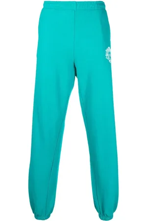 Sporty & Rich Crest logo print track pants