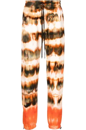 AMIRI Tie-dye print cotton track pants