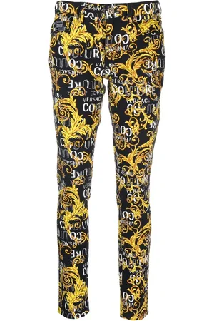 VERSACE Logo-print skinny jeans