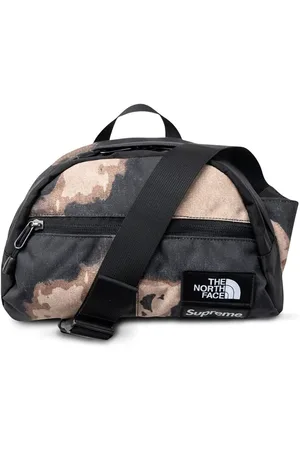 Supreme X The North Face Roo II bleached denim-print bag