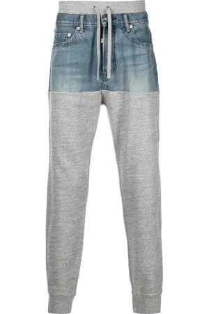 ROMEO HUNTE Denim-panelled jersey trousers