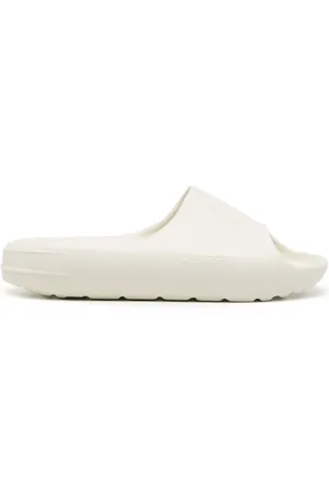 Represent Logo-embossed ridged slides
