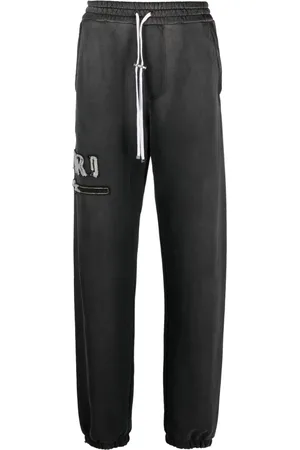 AMIRI Logo-appliqué cotton track pants