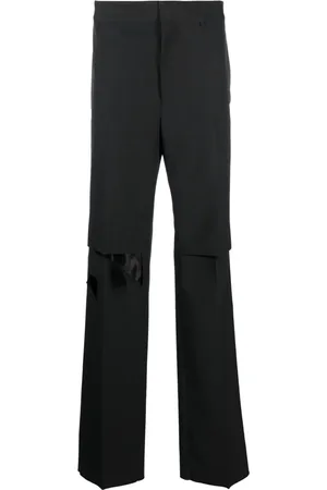 Givenchy Distressed wool trousers