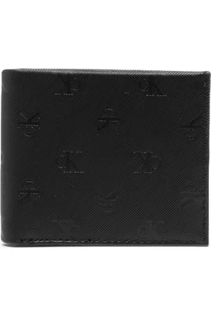 Louis Vuitton Embossed Logo Wallet - Farfetch