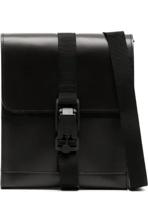 Makavelic Embossed-logo leather shoulder bag