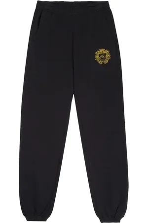 Sporty & Rich Crest-print cotton track pants