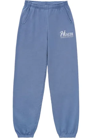 Sporty & Rich Slogan-print cotton track pants