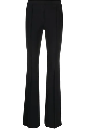 CHIARA BONI Pressed-crease flared trousers