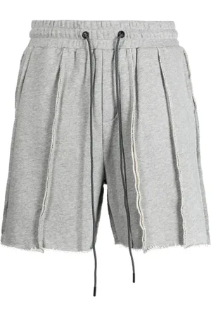 MOSTLY HEARD RARELY SEEN Exposed-seam cotton track shorts