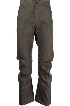 JUNYA WATANABE Stripe-print wool trousers