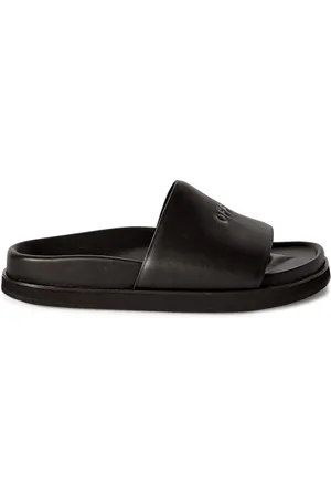 OFF-WHITE Logo-debossed leather slides