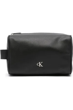 Calvin Klein Embossed monogram-pattern wash-bag - Farfetch